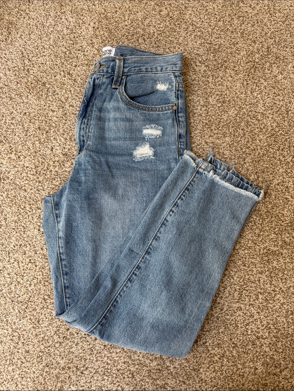 High-Rise Light Blue Distressed Ankle Jeans with Frayed Hem